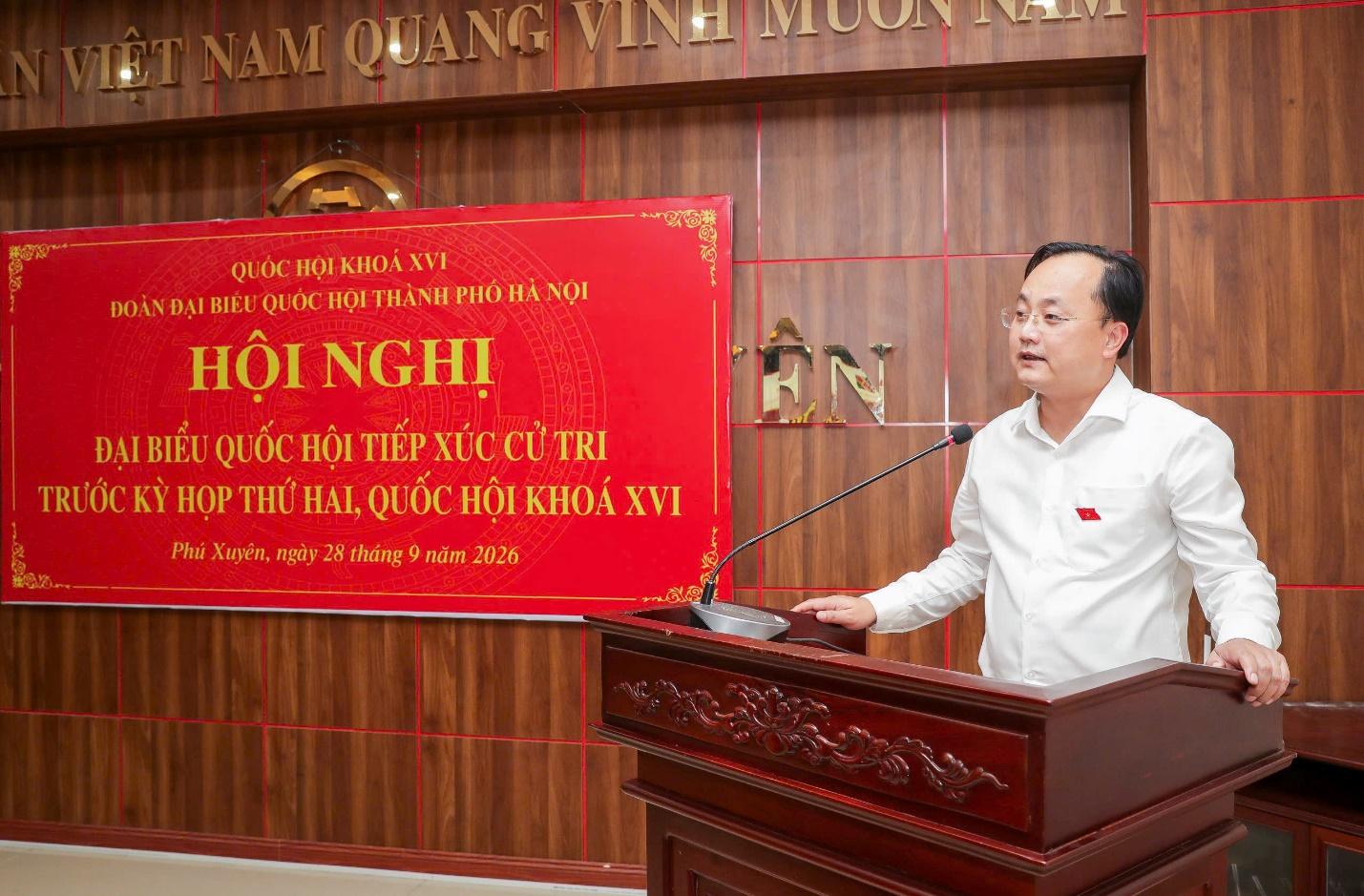 Agribank cùng Đoàn đại biểu Quốc hội thành phố Hà Nội trao 1 tỷ đồng hỗ trợ xây dựng Nhà Đại đoàn kết - Ảnh 1.